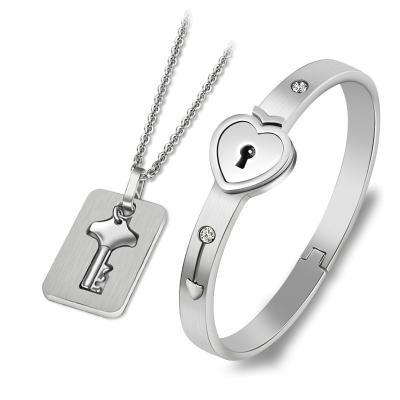 China Hot Jewelry TRENDY New A Fashion Set Stainless Steel Jewelry Heart Lock Key Couples Bracelet for sale