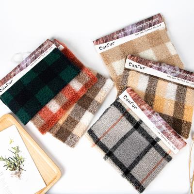 China Soft and Insulating 100% Polyester Plaid Sherpa Fleece Fabric for Garments Shell for sale