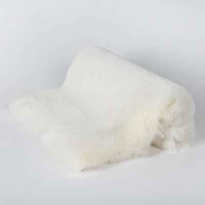 China Knitted Luxury Long Pile 100% Polyester Fake Rabbit Faux Fur Fabric for Hood and Scarf for sale