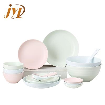 China 16 PCS Sustainable Pink Light Green Sky Blue Embossed Waves Handmade Ceramic Pottery Round Dinnerware Set for sale