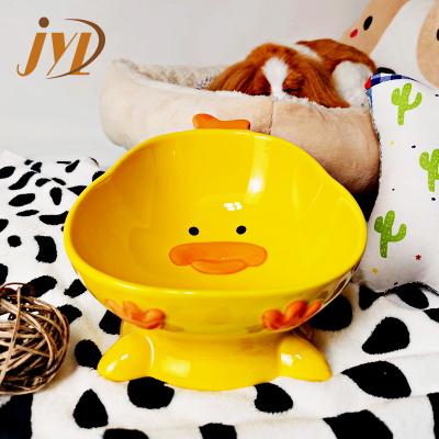 China Sustainable Raised Stand Raised Duck Shape White Yellow Shiny Gloss Cute Kawaii Dog Ceramic Pet Bowl for sale