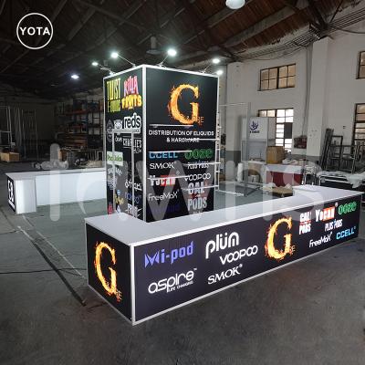 China Yes Tawns 20' Custom Island Trade Show Stand with Backlit Counters and Storage Room for sale