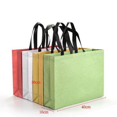 China 100% Eco-friendly customize luxury silver gold boutique shopping packaging pp laminated non woven bag with Logo Bag non woven shopping bag for sale