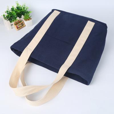 China Economica Handled Printed Logo Printed Laminated Handbag Cotton Canvas Wear Resistant Storage Bag With Zipper for sale