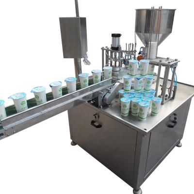 China Beverage Small Volume Small Plastic Water And Sauce Cup Filling Sealing Machine for sale