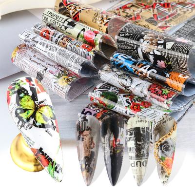 China Easy Apply New Style English Newspaper Nail Transfer Foil Stickers Letter Butterfly Designers Nail Foil for sale