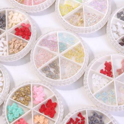 China Easy Apply Best Selling Aurora Butterfly Nail Charms Design Fake Nail Stones Backs Nail Decorations for sale