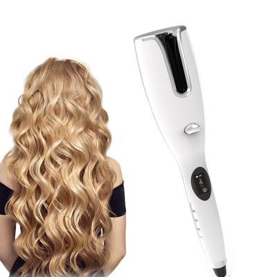 China hierro que se encrespa giratorio giratorio auto del pelo del bigudí de pelo 50W para las mujeres en venta