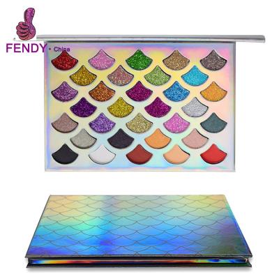 China Custom Brand Color Glitter Eyeshadow Palette 32 SHELL Shaped Holographic Color Waterproof for sale