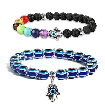 China LC Handmade Jewelry 2Pcs /Set 7 Chakras Gemstone Lava Stone Hamsa Hand Blue Eye Charm Bracelet Waterproof Evil Beaded Stretch Bracelet for sale