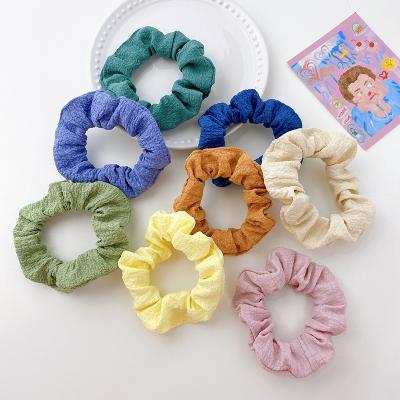 China Soft Solid Color Hair Puff Hair Ties Fabric Scrunchies Comfortable Soft Hair Holder Large Hair Band for sale