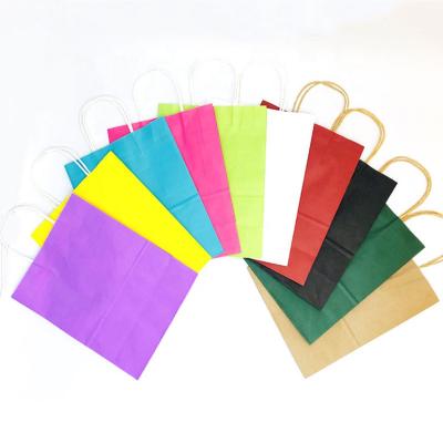 China Disposable Custom Paper Gift Bags Medium Size Logo Paper Bags Retail Volume for sale