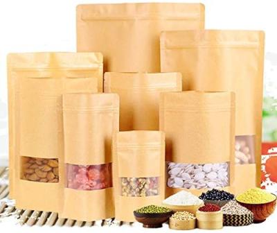 China Recyclable Zip Lock Kraft Paper Window Packaging Bag Stand Up Gift Dry Food Fruit Tea Packaging Pouches for sale