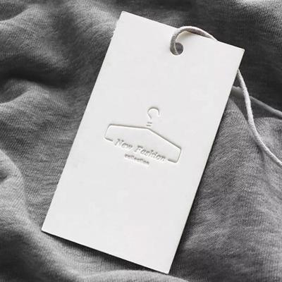 China Eco-friendly Custom Clothing Cardboard Paper Hang Tags Special Paper Embossed Logo Hang Tags For Clothing for sale