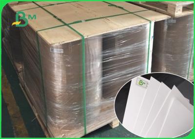 China Los altos lados brillantes de 80gsm 90gsm 100gsm dos cubrieron el papel 79 * el 109cm de Couche para el bolso en venta