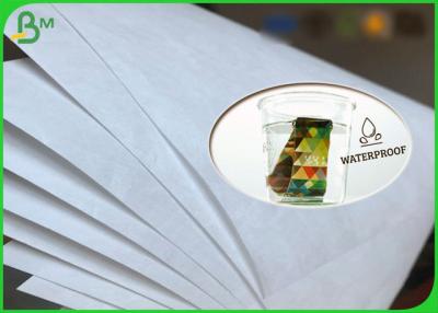 China papel de imprenta resistente de Du Pont Tyvek del rollo de agua de 75g 1073D para la pulsera en venta