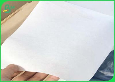 China rollo sin blanquear los 60cm del papel de categoría alimenticia del papel impermeable a la grasa de 38gsm 40gsm 700m m 500m m en venta