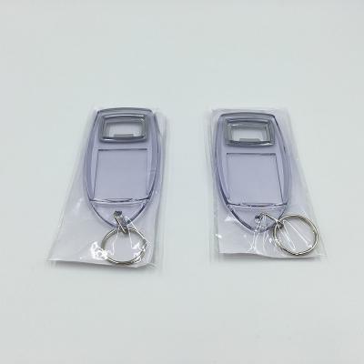 China Photo Viable Transparent Frame Custom Keychain Bottle Opener for sale