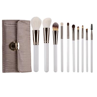 China Angular Blush Superior-quality Natural Hair Makeup Brushes 10 Pcs White Silver Makeup Brushes With Makeup Bag for sale