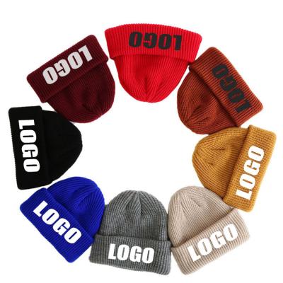 China Custom Logo Unisex Acrylic Jacquard Winter Protective Sweater JOINT Warm Winter Knitted Sports Ski Beanie for sale