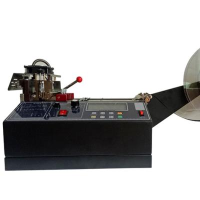 China HX-988 CLOTHING Automatic Computer LCD Display Tape Cutting Machine. nylon slitter for sale