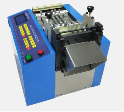 China Automatic Clothing PVC Heat Shrink Sleeve Tube Shrink Cutting Machine for sale