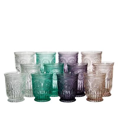 China New Classic/Postmodern Old Fashioned Sunflower Embossed Custom Multi Color Water Tea Juice Glass Tumbler for sale