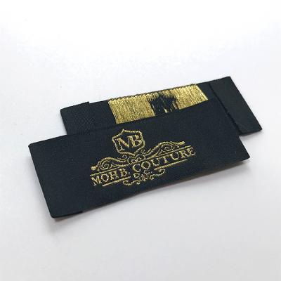 China High Definition Sustainable Fashion 75D Black Polyester Garment Ground Damask Woven Label for sale