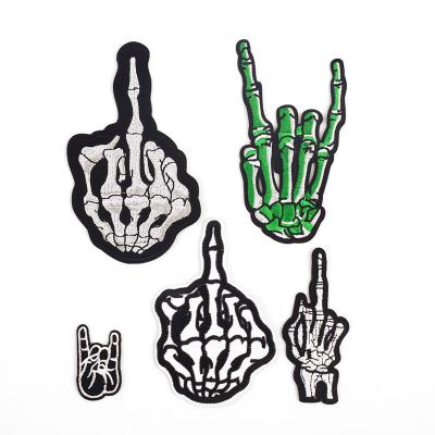 China Sustainable Rock Hand Gesture Finger Bone Embroidered Iron On Patch For Clothing for sale