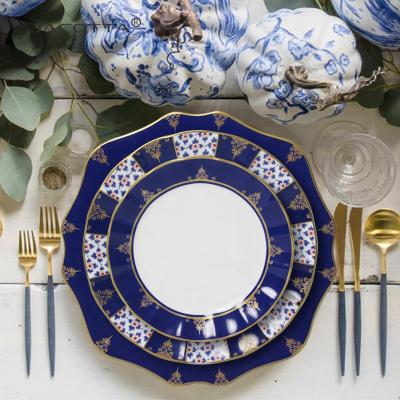 China JACOTTA Sustainable Top Selling Irregular Ceramic Dishes And Porcelain Dinner Dishes Gold Edged Blue Flower Dishes for sale