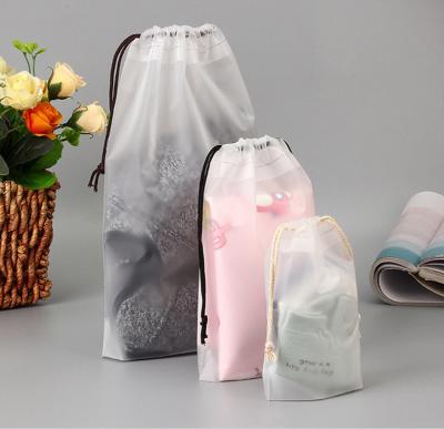 China EVA Beam CLOTHING Pouch Drawstring Bag Clothes Storage Bag Matte Plastic Waterproof Clear Tote Bag Custom Logo for sale