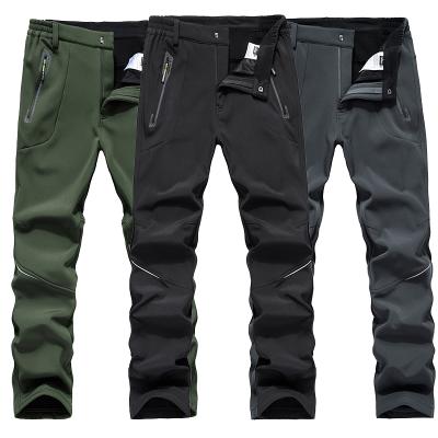 China Breathable Sporty Outdoor Wear Men Windproof Warm Rising Water Repellent Riding Pants Softshell Pants for sale