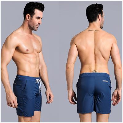 China Custom Colorful Logo Men's Wholesale Factory Waist String Elastic Quick-Drying Gym Breathable Sports Shorts With Two Pockets for sale