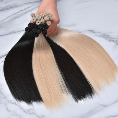 China Silky Straight Wave Thin And Soft Hand Tied Hair Weft Extension Hair Extension Russian Unprocessed Hair Wholesale for sale