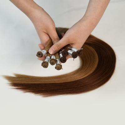 China Remy Soft Hand Tied Weft Human Hair Extension Cuticle Hand Supplier Wholesale Drawn Double Weft Silky Straight Wave Hair Extension for sale