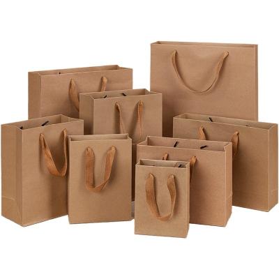 China 13*19*6cm Small Shopping Bags High Quality Cheap Kraft Shopping Paper Bag With Handles Te koop