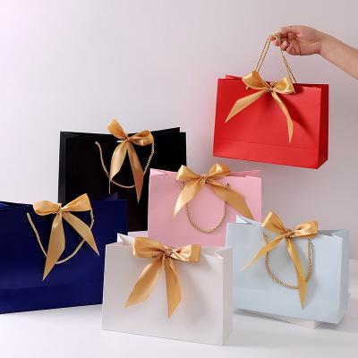 China 2021 Fashion Custom Size Large Retail Bag Paper Shopping Bags With Handle Te koop