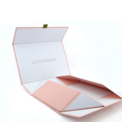 China Recyclable Custom Logo Pink Foldable Cardboard Magnetic Gift Packaging Box for sale