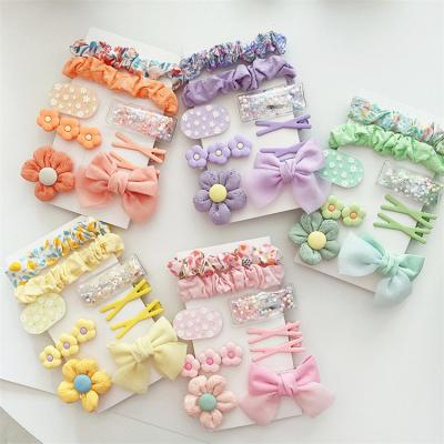 China Hair decoration 9 Pcs/Set Cute Hair Floral Bow Baby Girls Hair Clips & Ponytail Holder Xmas Hair Accessories Gift Set for sale