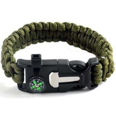 China Brazalete Paracord de exterior con arrancador de fuego y correa de silbato Equipo de supervivencia esencial en venta