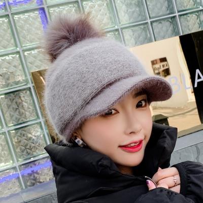 China 2022 raccoon ball cap wool hat waterproof knitted double female raincoats without brim thick warm hat for sale