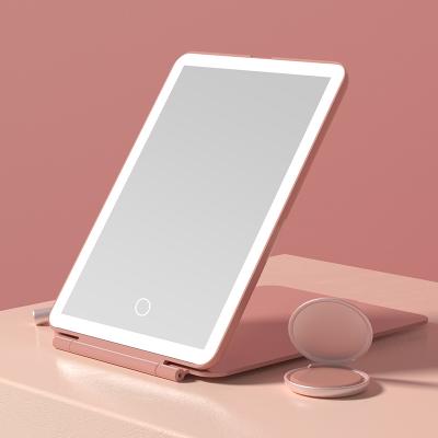 China Pocket Lighted Ipad Shape Mirror LED Beauty Light Makeup Mirror Portable Folding Cosmetic Hand Mirror for sale