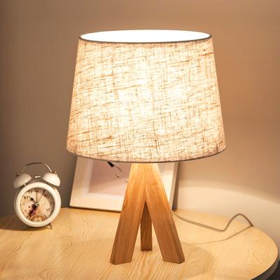 China Nordic Modern Led Table Lamp Bedroom Bedside Solid Wood Table Lamp New Modern Minimalist Hotel Project Strange for sale