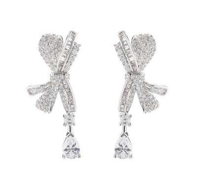 China 2021 FASHIONABLE colorful bow tie shining diamond inlaid hanging clear crystal ladies type earrings for sale