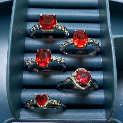 China Trendy factory fashion charm rhodium ring red zircon opening ring wholesale copper plated adjustable zircon for sale