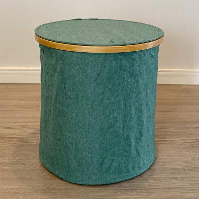 China Eco - Friendly Round Bamboo Cloth Frame Art Collapsible Storage With Lid And Handles for sale