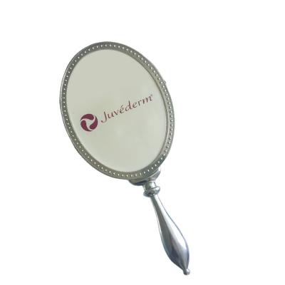 China Customized Customized Hand Magnifying Giant Logo Cosmetic Hand Held Cosmetic Mirror Hand Held Metal Mirror for sale