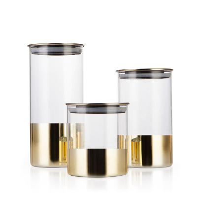 China Customized Viable High Borosilicate Spice Glass Jars With Lids Food Storage Container Bamboo Airtight Home Kitchen With Gold Painting for sale