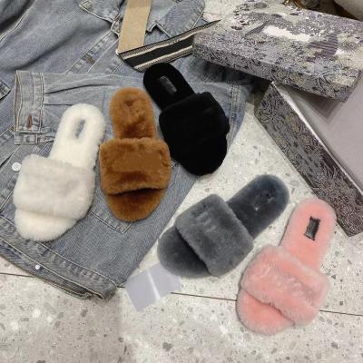 China New sale 2021 trend fashion plush fur slipper winter disegn fashion home famous brand warm high quality fluffy soft slipper shoes for sale