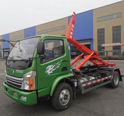 China High Quality Building Material Stores Sinotruk CDW Container Hook Arm Detachable Garbage Truck for sale